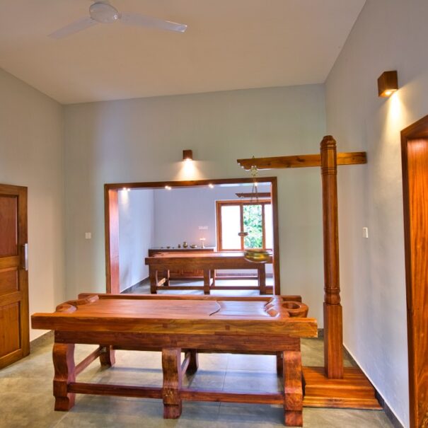 Couple treatment room at Softouch Ayurveda Village Kerala, offering a serene and intimate space for shared relaxation and wellness.
