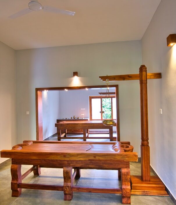 Couple treatment room at Softouch Ayurveda Village Kerala, offering a serene and intimate space for shared relaxation and wellness.