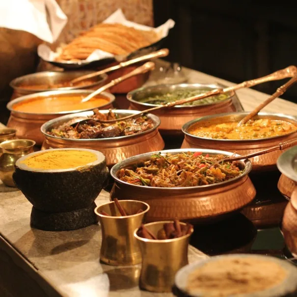 Join our talented chef in our open-air kitchen for an authentic Indian cooking experience. Watch a cooking demonstration, get hands-on assistance, and take home a recipe