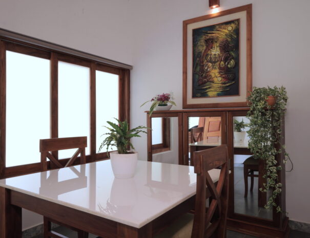 Ayur Villa - sitting area with desk at Softouch Ayurveda Village & Resort Kerala
